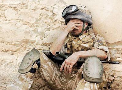 soldier covering his face